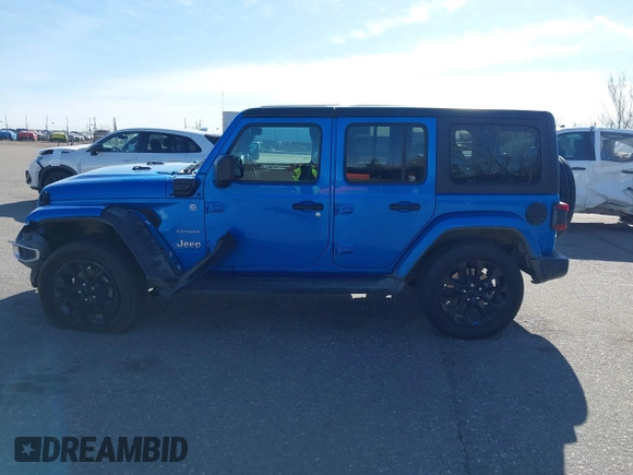 2023 Jeep Wrangler Sahara z VIN 1C4JJXP60PW513969, wystawiony jako IAAI lot #41766631 z przebiegiem 34 819 mil mil oraz . Historia ofert i sprzedaży dostępna na DreamBid. Obrazek 15.