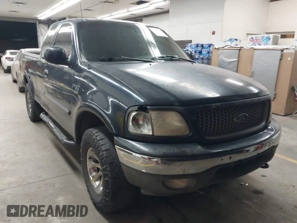 1999 Ford F-150 XL with VIN 1FTRX18L5XKB05347, listed as a IAAI auction lot 41885737 with 250,070 mi miles. Bid and sale history available at carsss.com. Image 1.