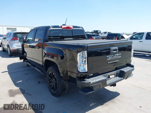2022 GMC Canyon 2WD Elevation with VIN 1GTG5CEN5N1151794, listed as a IAAI auction lot 41876656 with 57,305 mi miles. Bid and sale history available at carsss.com. Image 3.