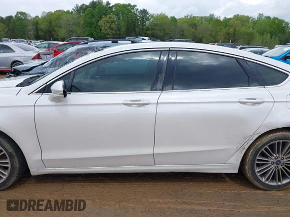 2015 Ford Fusion SE with VIN 3FA6P0HD9FR123677, listed as a IAAI auction lot 42021493 with 166,446 mi miles and . Bid and sale history available at DreamBid. Image 14.