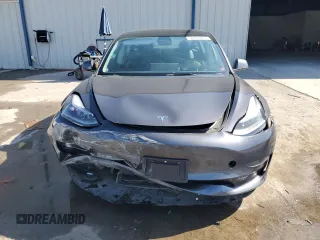 2023 Tesla Model 3 with VIN 5YJ3E1EA7PF456613, listed as a Copart auction lot 56940255 with 35,920 mi miles and Non repairable. Bid and sale history available at DreamBid. Image 5.