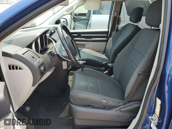 2010 Dodge Grand Caravan Hero with VIN 2D4RN3D11AR332164, listed as a Copart auction lot 48874355 with 136,137 mi miles and Non Repairable. Bid and sale history available at DreamBid. Image 7.
