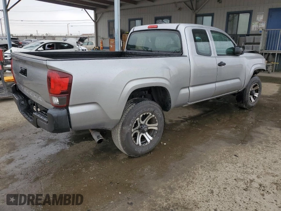 2018 Toyota Tacoma SR with VIN 5TFRX5GN1JX124112, listed as a Copart auction lot 50596975 with 57,587 mi miles and Salvage Title. Bid and sale history available at DreamBid. Image 3.