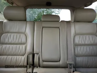 2003 Lexus LX 470 z VIN JTJHT00W433528655, wystawiony jako Copart lot #58097115 z przebiegiem 240 275 mil mil oraz Tytuł czysty. Historia ofert i sprzedaży dostępna na DreamBid. Obrazek 10.