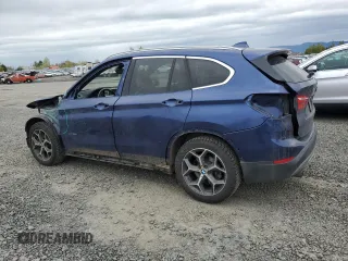 2016 BMW X1 xDrive28i with VIN WBXHT3C33G5E49242, listed as a Copart auction lot 51947625 with 105,538 mi miles and Salvage Title. Bid and sale history available at carsss.com. Image 2.