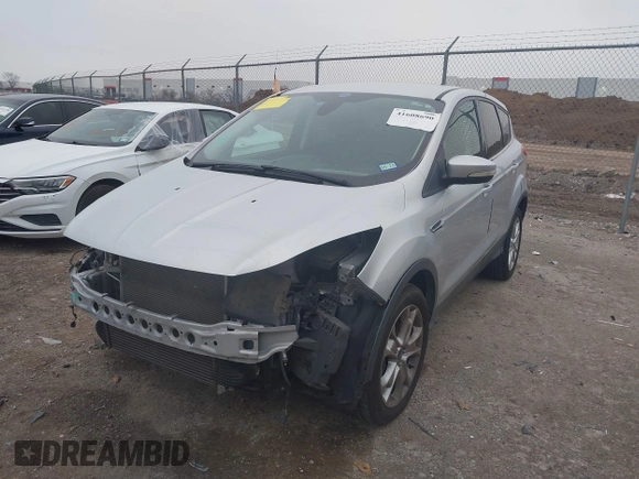 2013 Ford Escape SEL with VIN 1FMCU0H95DUA30836, listed as a IAAI auction lot 41608690 with 150,517 mi miles. Bid and sale history available at carsss.com. Image 2.