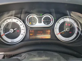 2014 FIAT 500L Easy z VIN ZFBCFABH8EZ000709, wystawiony jako Copart lot #82097694 z przebiegiem 72 984 mil mil oraz Szkoda całkowita • Salvage title. Historia ofert i sprzedaży dostępna na DreamBid. Obrazek 9.