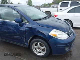 2007 Nissan Versa 1.8 SL with VIN 3N1BC11E67L420474, listed as a IAAI auction lot 41887735 with 199,094 mi miles. Bid and sale history available at carsss.com. Image 6.