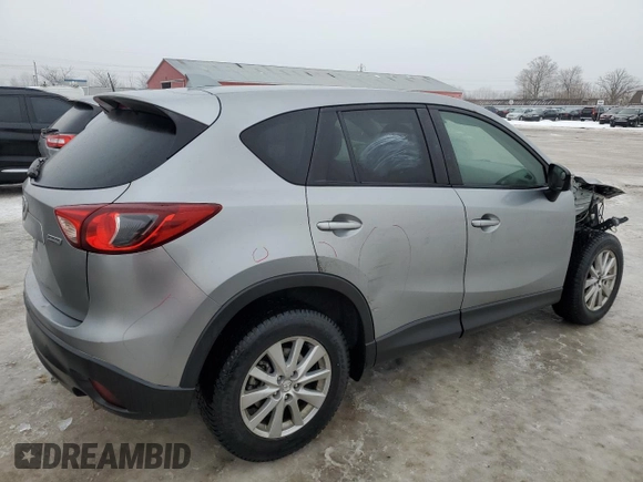 2015 Mazda CX-5 Sport with VIN JM3KE4BEXF0499688, listed as a Copart auction lot 88988095 with 258,460 mi miles and Salvage title. Bid and sale history available at DreamBid. Image 3.