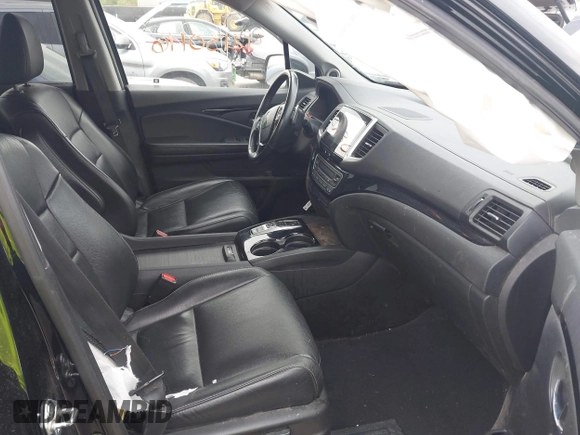 2017 Honda Pilot Touring with VIN 5FNYF6H93HB028122, listed as a IAAI auction lot 42130116 with 109,318 mi miles and . Bid and sale history available at DreamBid. Image 5.