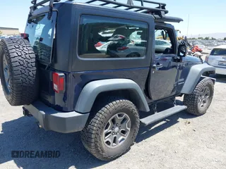 2013 Jeep Wrangler Sport with VIN 1C4AJWAG3DL627179, listed as a IAAI auction lot 42262246 with 33,536 mi miles and . Bid and sale history available at DreamBid. Image 4.