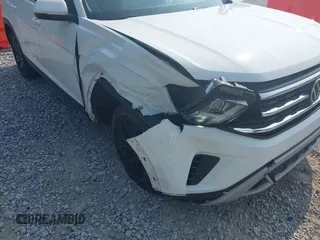 2023 Volkswagen Atlas SE z VIN 1V2WR2CA6PC547040, wystawiony jako IAAI lot #42400535 z przebiegiem 25 300 mil mil oraz . Historia ofert i sprzedaży dostępna na DreamBid. Obrazek 6.