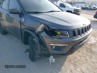2019 Jeep Compass Trailhawk with VIN 3C4NJDDB9KT622415, listed as a IAAI auction lot 41779314 with 98,930 mi miles and . Bid and sale history available at carsss.com. Image 6.