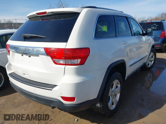 2012 Jeep Grand Cherokee Laredo with VIN 1C4RJFAG6CC279427, listed as a IAAI auction lot 41956034 with 86,689 mi miles. Bid and sale history available at carsss.com. Image 4.