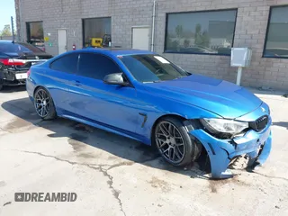 2015 BMW 4 Series 435i with VIN WBA3R1C50FF774588, listed as a IAAI auction lot 42001394 with 96,400 mi miles and . Bid and sale history available at carsss.com. Image 1.