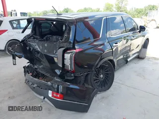2021 Hyundai Palisade SEL z VIN KM8R34HE5MU202798, wystawiony jako IAAI lot #42339654 z przebiegiem 104 689 mil mil oraz . Historia ofert i sprzedaży dostępna na DreamBid. Obrazek 4.