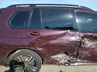 2022 BMW X7 xDrive40i z VIN 5UXCW2C00N9K81494, wystawiony jako Copart lot #51406425 z przebiegiem Nie podano mil oraz Szkoda całkowita • Salvage title. Historia ofert i sprzedaży dostępna na DreamBid. Obrazek 11.