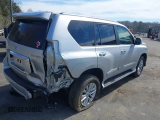 2015 Lexus GX 460 with VIN JTJBM7FX3F5115775, listed as a IAAI auction lot 41669011 with 111,658 mi miles and . Bid and sale history available at carsss.com. Image 4.