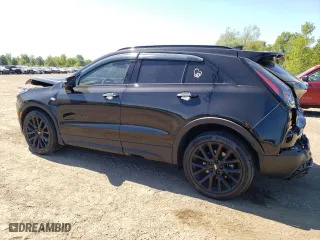 2023 Cadillac XT4 FWD Sport with VIN 1GYFZER41PF225631, listed as a Copart auction lot 70441144 with 13,689 mi miles and Salvage Title. Bid and sale history available at carsss.com. Image 2.
