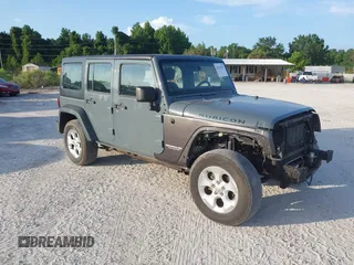 2014 Jeep Wrangler Unlimited Sport with VIN 1C4BJWDG5EL327225, listed as a IAAI auction lot 42547991 with 129,545 mi miles and . Bid and sale history available at DreamBid. Image 1.