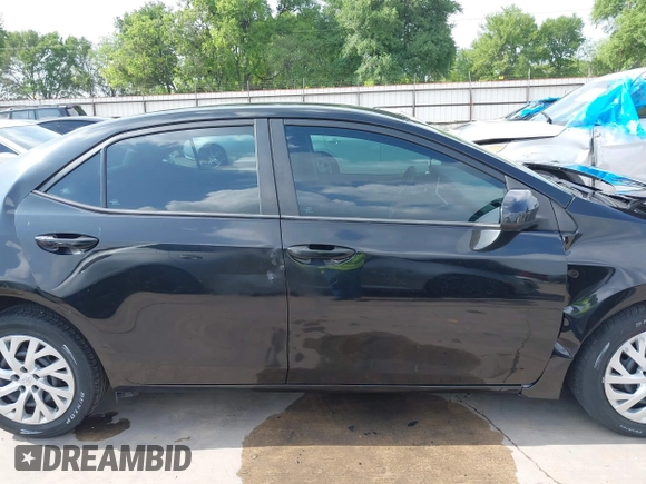 2019 Toyota Corolla L z VIN 5YFBURHE7KP905555, wystawiony jako IAAI lot #41943232 z przebiegiem 83 213 mil mil oraz . Historia ofert i sprzedaży dostępna na DreamBid. Obrazek 14.