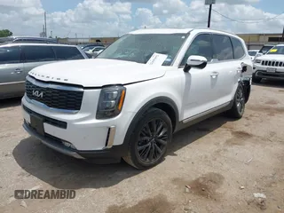 2022 Kia Telluride SX with VIN 5XYP54HC7NG219318, listed as a IAAI auction lot 42449492 with 25,574 mi miles and . Bid and sale history available at DreamBid. Image 2.