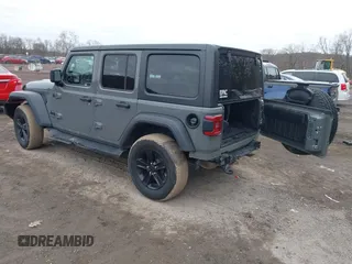 2021 Jeep Wrangler Unlimited Sport Altitude with VIN 1C4HJXDG1MW603784, listed as a IAAI auction lot 41509231 with 102,567 mi miles and . Bid and sale history available at DreamBid. Image 3.