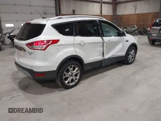 2016 Ford Escape Titanium with VIN 1FMCU9J95GUB02377, listed as a IAAI auction lot 41869557 with 88,441 mi miles. Bid and sale history available at carsss.com. Image 4.