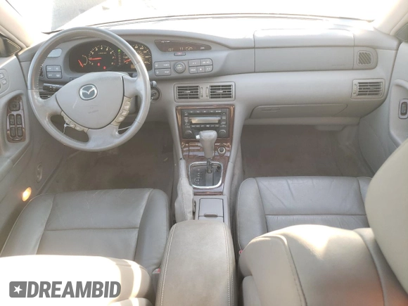 2002 Mazda Millenia z VIN JM1TA221021729625, wystawiony jako Copart lot #87304234 z przebiegiem 88 376 mil mil oraz Szkoda całkowita • Salvage title. Historia ofert i sprzedaży dostępna na DreamBid. Obrazek 8.