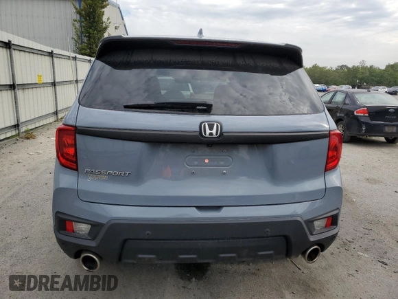 2022 Honda Passport EX-L z VIN 5FNYF7H51NB004450, wystawiony jako Copart lot #54874325 z przebiegiem 33 453 mil mil oraz Szkoda całkowita • Salvage title. Historia ofert i sprzedaży dostępna na DreamBid. Obrazek 6.