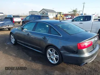 2014 Audi A6 Prestige with VIN WAUHGBFC8EN104920, listed as a IAAI auction lot 41827864 with 70,289 mi miles and . Bid and sale history available at DreamBid. Image 3.