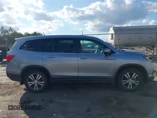 2018 Honda Pilot EX-L with VIN 5FNYF5H56JB000683, listed as a IAAI auction lot 41470855 with 80,301 mi miles. Bid and sale history available at carsss.com. Image 13.