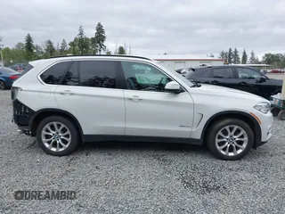 2016 BMW X5 xDrive40e z VIN 5UXKT0C55G0S77047, wystawiony jako IAAI lot #42224623 z przebiegiem 102 611 mil mil oraz . Historia ofert i sprzedaży dostępna na DreamBid. Obrazek 14.