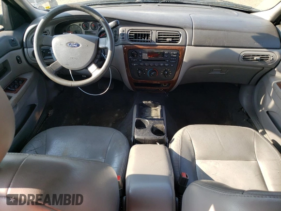 2006 Ford Taurus SEL with VIN 1FAFP56U56A121841, listed as a Copart auction lot 64722045 with 147,223 mi miles and Salvage title. Bid and sale history available at DreamBid. Image 8.