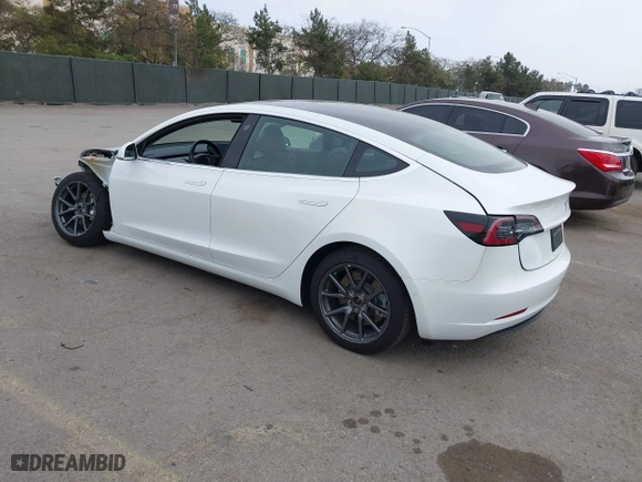 2019 Tesla Model 3 Long Range with VIN 5YJ3E1EB2KF361541, listed as a IAAI auction lot 41859373 with 54,664 mi miles. Bid and sale history available at carsss.com. Image 3.