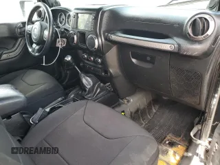 2014 Jeep Wrangler Sport with VIN 1C4AJWAG1EL200181, listed as a Copart auction lot 61165595 with 101,234 mi miles and Salvage title. Bid and sale history available at DreamBid. Image 8.