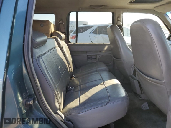 1997 Ford Explorer XL with VIN 1FMDU34E2VZC03015, listed as a Copart auction lot 80654764 with 295,587 mi miles and Salvage title. Bid and sale history available at DreamBid. Image 10.