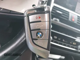 2019 BMW X4 xDrive30i with VIN 5UXUJ3C52KLG54945, listed as a IAAI auction lot 42083434 with 153,956 mi miles and . Bid and sale history available at DreamBid. Image 11.