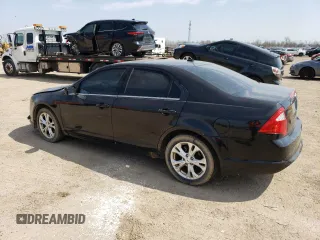2012 Ford Fusion SE z VIN 3FAHP0HA1CR240275, wystawiony jako Copart lot #54240545 z przebiegiem 279 950 mil mil oraz Szkoda całkowita • Salvage title. Historia ofert i sprzedaży dostępna na DreamBid. Obrazek 2.