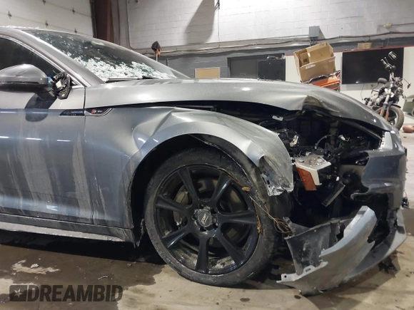 2018 Audi A5 Premium Plus with VIN WAUTNAF50JA011354, listed as a IAAI auction lot 41396659 with 74,936 mi miles and . Bid and sale history available at DreamBid. Image 6.