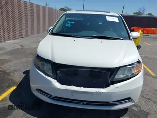 2015 Honda Odyssey EX-L with VIN 5FNRL5H67FB017554, listed as a IAAI auction lot 41974821 with 76,130 mi miles and . Bid and sale history available at carsss.com. Image 12.