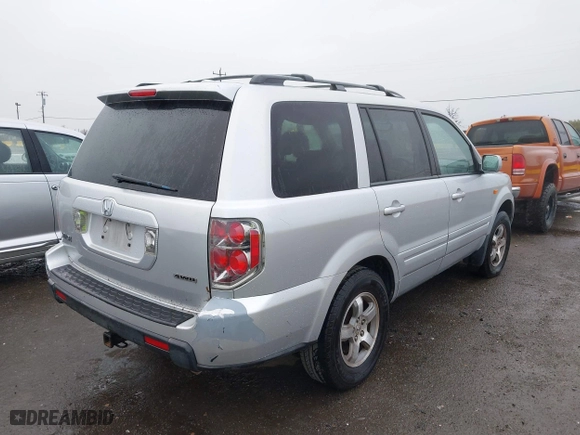2006 Honda Pilot EX-L with RES with VIN 2HKYF18636H515182, listed as a IAAI auction lot 41811646 with 198,820 mi miles. Bid and sale history available at carsss.com. Image 4.
