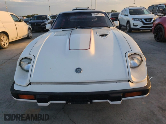 1983 Datsun 280ZX z VIN JN1HZ04S2DX564639, wystawiony jako Copart lot #75222314 z przebiegiem 75 925 mil mil oraz Szkody całkowita. Historia ofert i sprzedaży dostępna na DreamBid. Obrazek 5.
