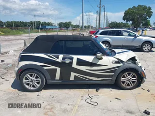 2015 MINI Convertible with VIN WMWZN3C53FT861968, listed as a IAAI auction lot 42717485 with 79,840 mi miles and . Bid and sale history available at DreamBid. Image 13.