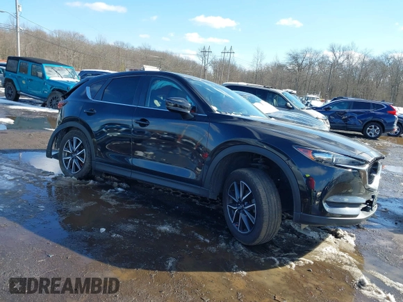 2018 Mazda CX-5 Touring with VIN JM3KFBCM2J0451828, listed as a IAAI auction lot 41531728 with 88,939 mi miles. Bid and sale history available at carsss.com. Image 13.