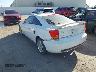 2000 Toyota Celica GTS with VIN JTDDY32T7Y0023984, listed as a IAAI auction lot 41715373 with 234,385 mi miles. Bid and sale history available at carsss.com. Image 3.