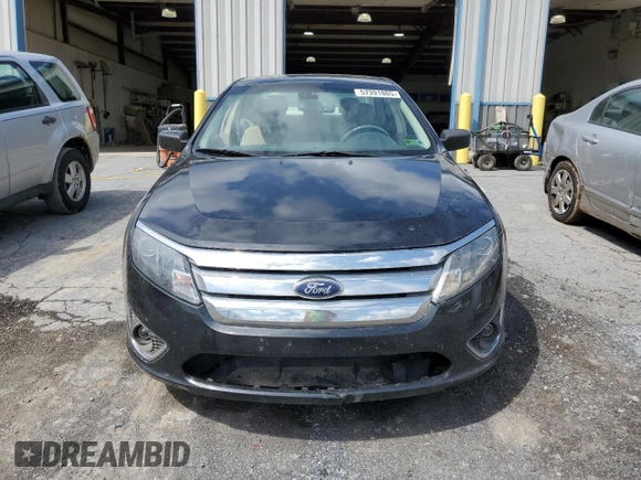 2012 Ford Fusion SEL z VIN 3FAHP0JG4CR388483, wystawiony jako Copart lot #57391805 z przebiegiem 184 665 mil mil oraz Szkoda całkowita • Salvage title. Historia ofert i sprzedaży dostępna na DreamBid. Obrazek 5.