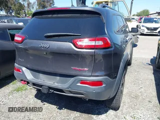 2018 Jeep Cherokee Trailhawk with VIN 1C4PJMBX0JD534722, listed as a IAAI auction lot 41557426 with 109,429 mi miles and . Bid and sale history available at DreamBid. Image 16.