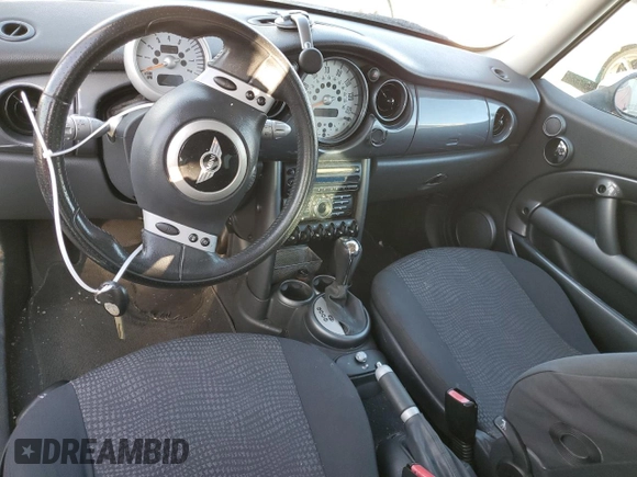 2004 MINI Hardtop with VIN WMWRC33474TJ53569, listed as a Copart auction lot 72429454 with 154,713 mi miles and Salvage Title. Bid and sale history available at DreamBid. Image 8.
