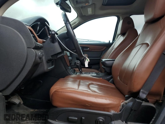 2016 Chevrolet Traverse LT with VIN 1GNKRHKD4GJ324044, listed as a Copart auction lot 55445295 with 127,450 mi miles and Salvage title. Bid and sale history available at DreamBid. Image 7.